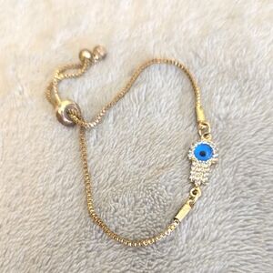 #021 Gold Tone and Blue Evil Eye Bracelet
